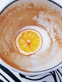 High angle view of coffee in glass on table