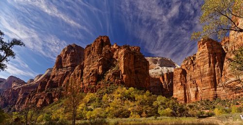 Panoramic view of landscape against cloudy sky