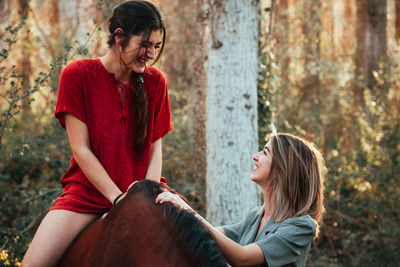 Young women sitting outdoors