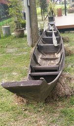 Abandoned truck on field in yard