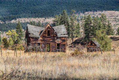 Abandoned built structure on landscape