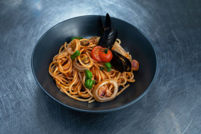 High angle view of noodles in plate on table