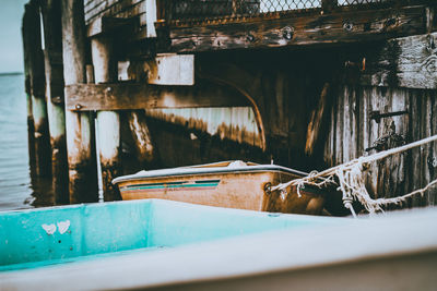 Old abandoned boat against building