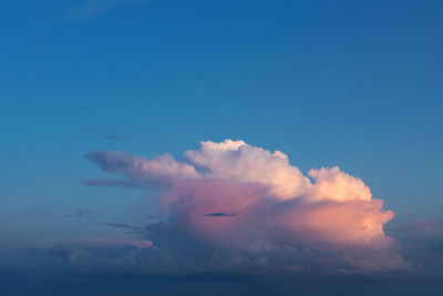 Beautiful atmospheric dramatic clouds in the evening at sunset.