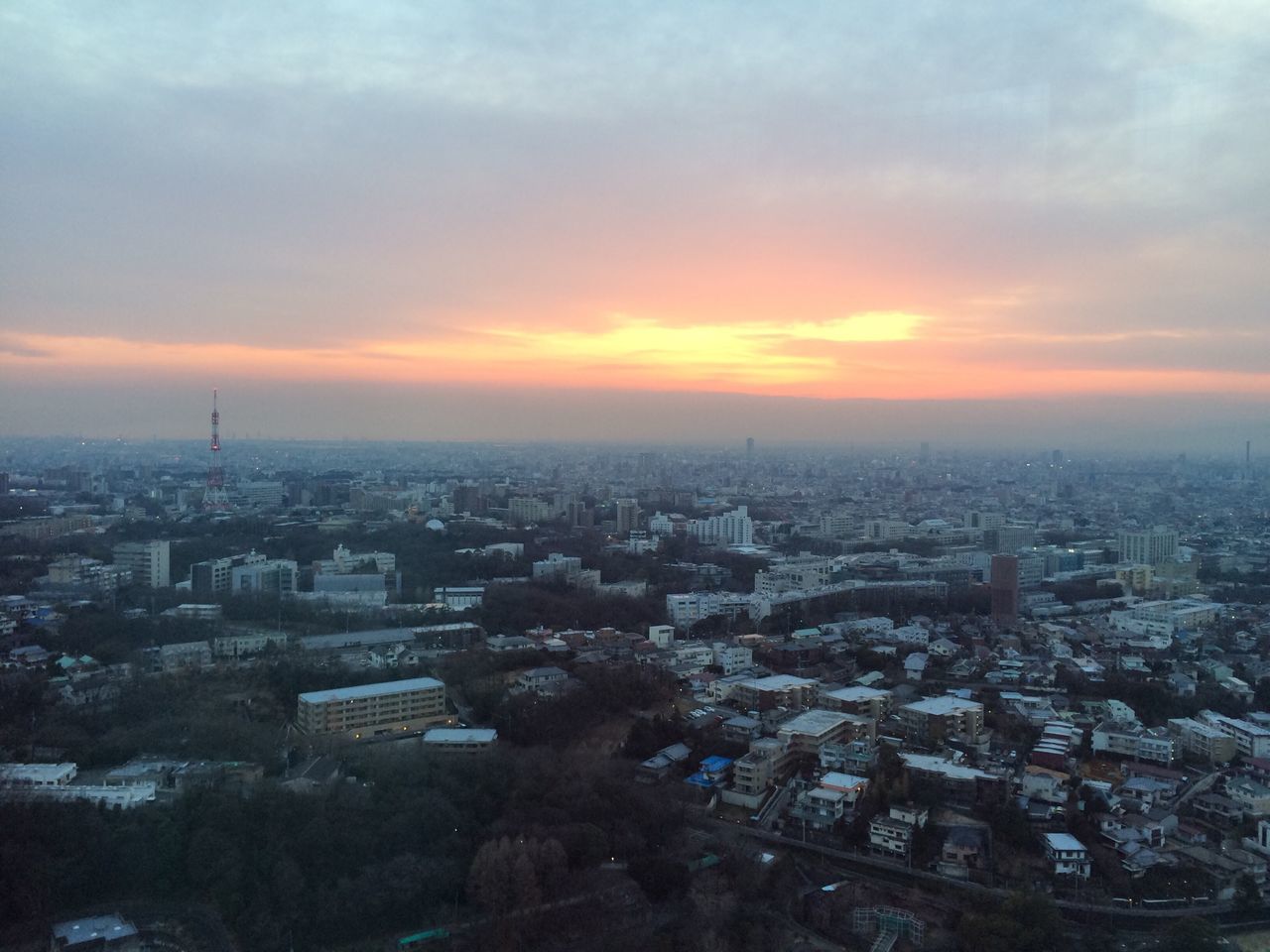 cityscape, city, building exterior, architecture, built structure, crowded, high angle view, sunset, sky, residential district, cloud - sky, aerial view, residential building, residential structure, orange color, city life, no people, outdoors, horizon over land, dusk