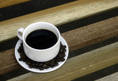 High angle view of black coffee on table