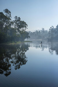 People are fishing at the morning with a beautiful scenery