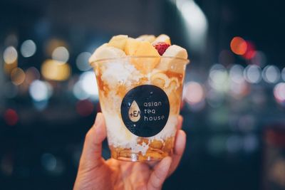 Close-up of woman holding ice cream