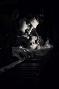 Portrait of man playing piano