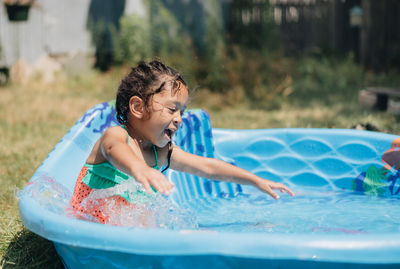 Boy in swimming pool