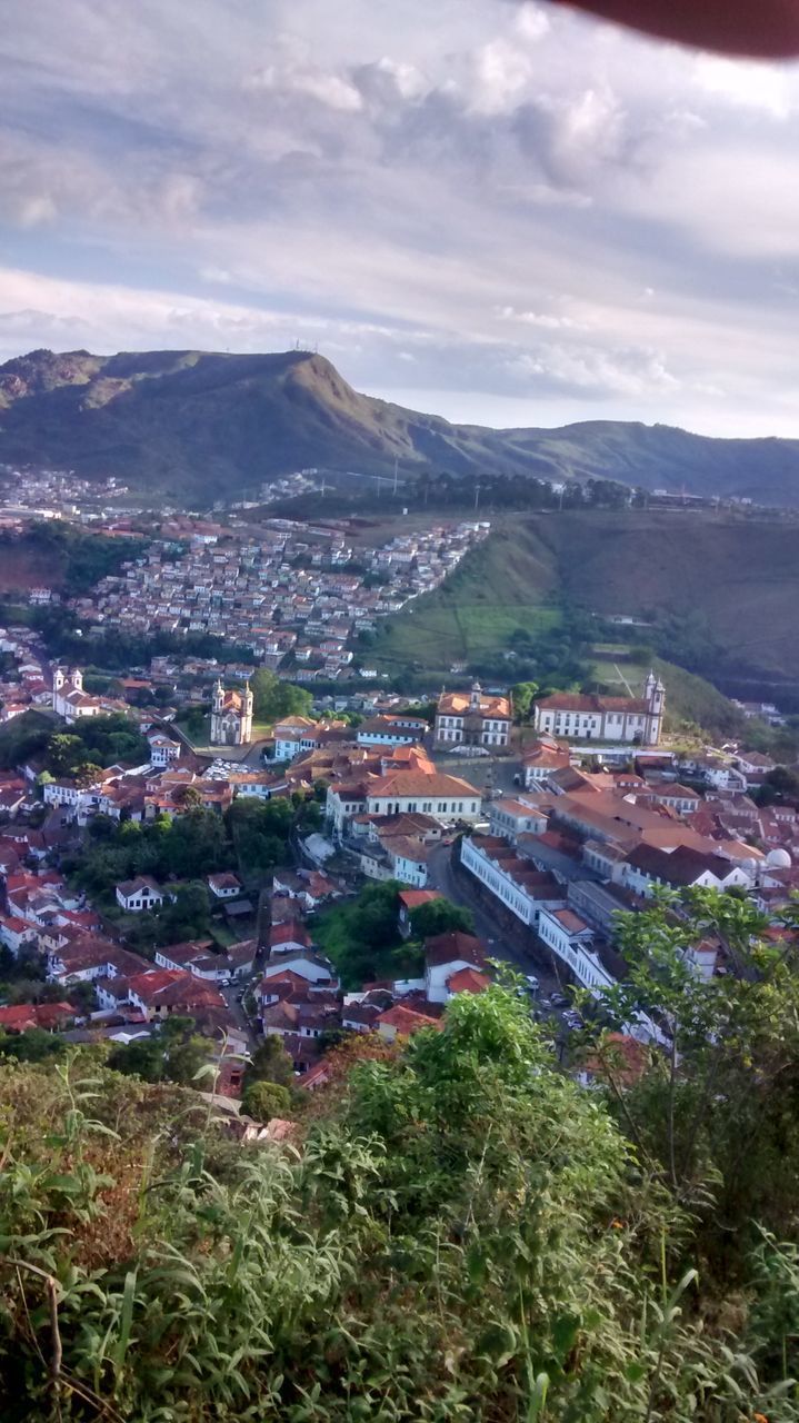 HIGH ANGLE VIEW OF HOUSES IN TOWN