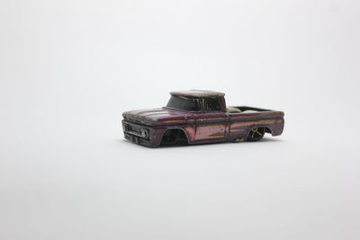Close-up of toy car against white background