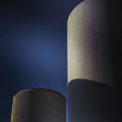 Low angle view of smoke stack against sky