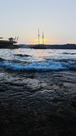 Scenic view of sea at sunset