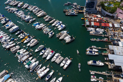 High angle view of boats moored at harbor