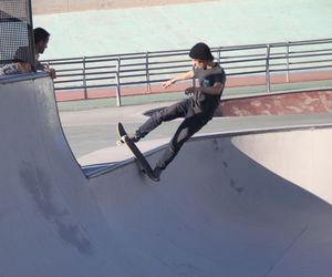 Full length of man skateboarding at park