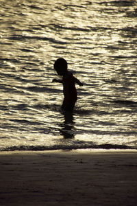 Woman standing in water