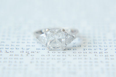 Close-up of wedding rings on white background