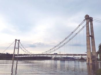 Bridge over river against sky