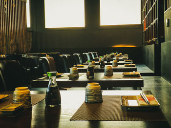 Close-up of wine bottles on table