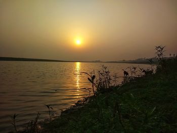 Scenic view of sea against sky during sunset