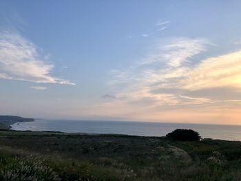 Scenic view of sea against sky during sunset