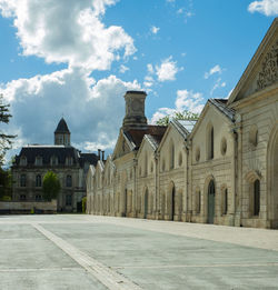 Buildings in city against sky