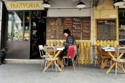 Chairs and tables in restaurant at cafe