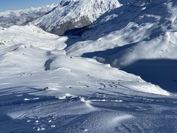 Scenic view of snow covered mountains