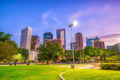 Buildings in city against sky