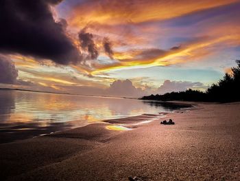 Scenic view of sea against dramatic sky