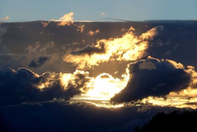 Low angle view of clouds in sky during sunset