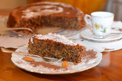 Close-up of cake served on table