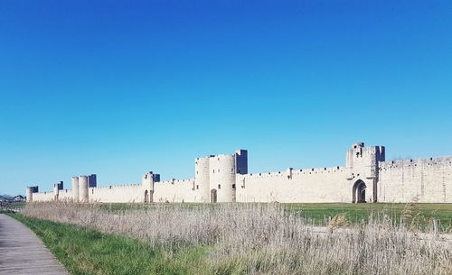 View of fort against clear blue sky