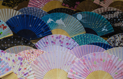 Full frame shot of multi colored hand fans
