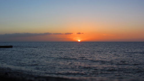 Scenic view of sunset over sea