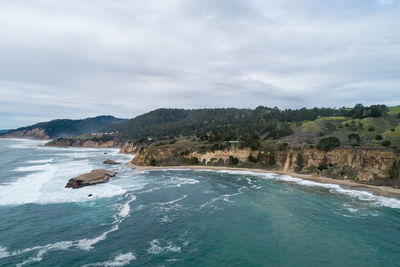 Greyhound rock and beach in background. california. usa