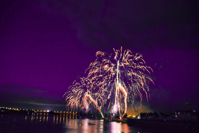 Firework display at night