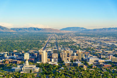 High angle view of buildings in city against sky