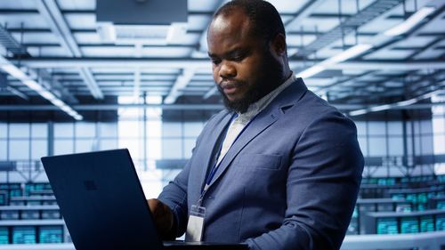 Young man using laptop