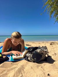 Scenic view of beach against clear sky