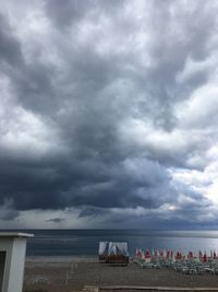 Scenic view of sea against cloudy sky