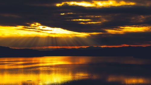 Scenic view of dramatic sky during sunset