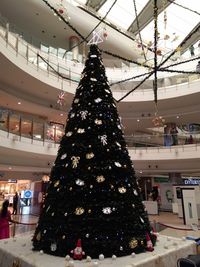 Low angle view of illuminated ceiling