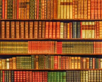 Full frame shot of books arranged in shelves