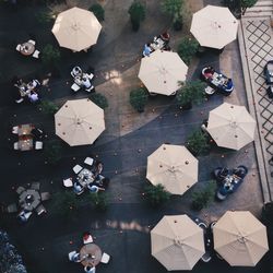 High angle view of people at sidewalk cafe
