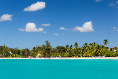 Scenic view of sea against blue sky