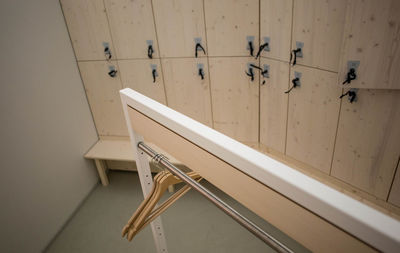 Close-up of clothes hanging on wood