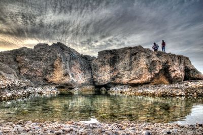 Scenic view of rock formation in sea