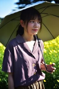 Portrait of girl standing outdoors